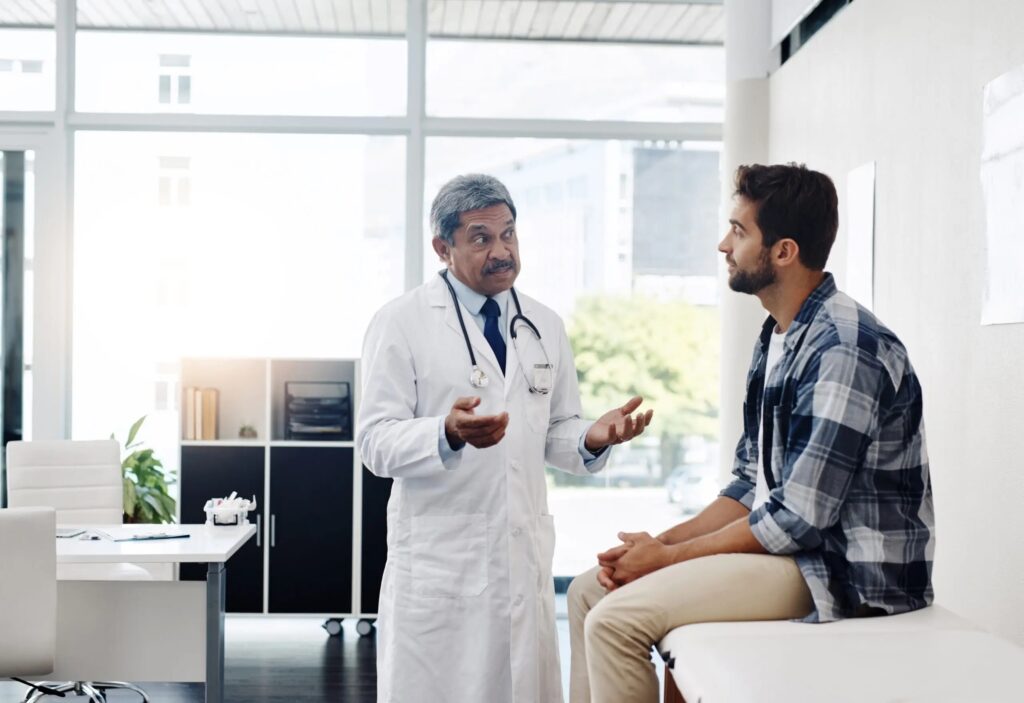 Man Speaking with Doctor AdobeSt
